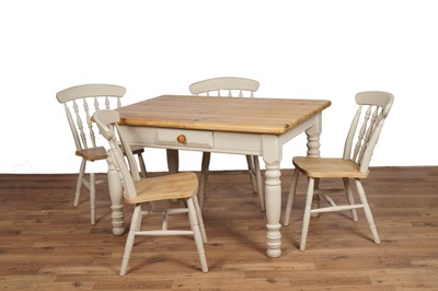 Lot 60 - A vintage pine table and four chairs