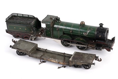 Lot 67 - A Marklin 0-Gauge 0-4-0 tinplate locomotive, tender and flatbed