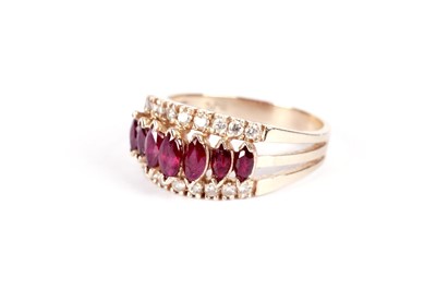 Lot 526 - A ruby and diamond dress ring