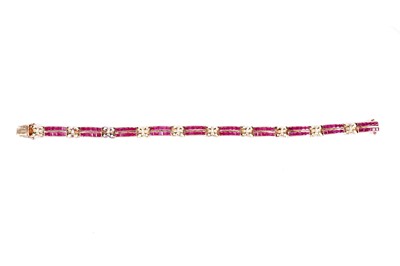 Lot 530 - A ruby and diamond bracelet