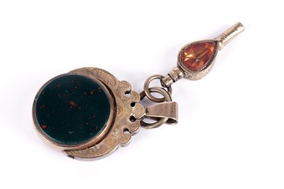 Lot 543 - A Victorian bloodstone and carnelian swivel fob; and a watch key
