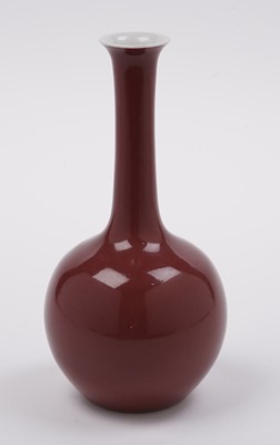 Lot 357 - A Chinese liver-red bottle vase