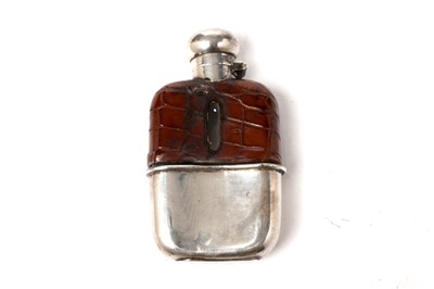 Lot 1667 - A George V silver mounted glass spirit flask