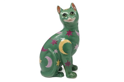 Lot 483 - A Wemyss-style earthenware figure of a cat