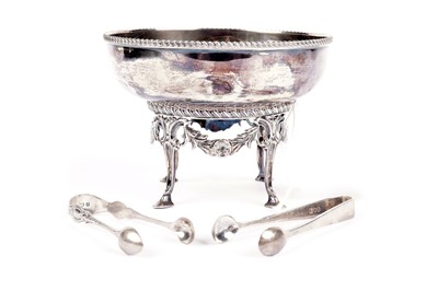 Lot 790 - An Edwardian silver circular sugar bowl and stand; with two pairs of sugar tongs