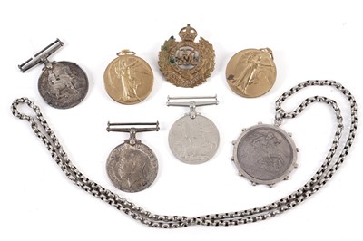 Lot 464 - WWI and WWII service medals; together with a WWII cap badge