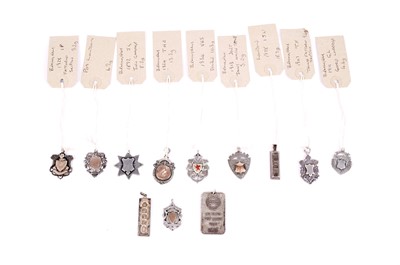 Lot 659 - A collection of silver fob medals