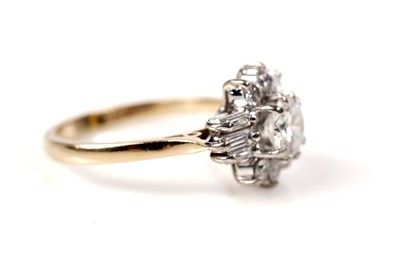 Lot 1209 - An Art Deco diamond dress ring