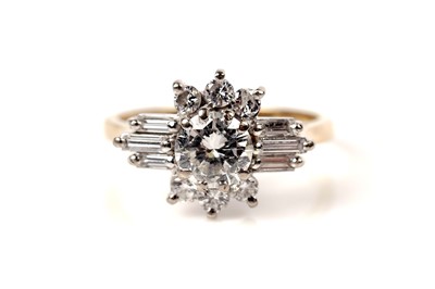 Lot 1209 - An Art Deco diamond dress ring