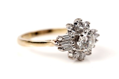 Lot 1209 - An Art Deco diamond dress ring