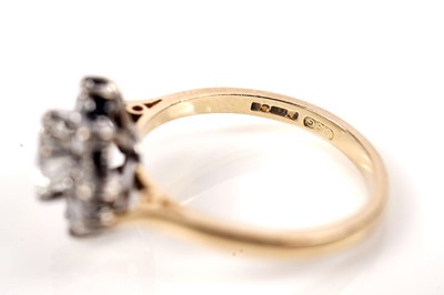 Lot 1209 - An Art Deco diamond dress ring