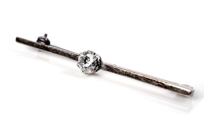 Lot 1210 - A solitaire diamond bar brooch