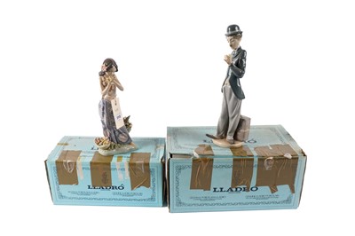 Lot 315 - A Lladro figure of Charlie Chaplin; and a Lladro figure of a Hawaiian girl