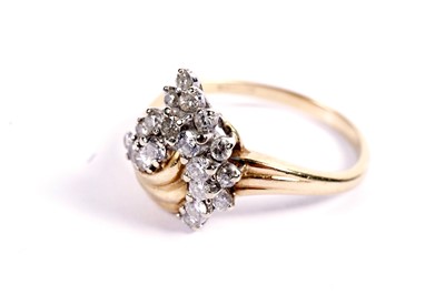 Lot 423 - A diamond cluster dress ring