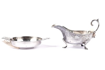 Lot 761 - An early 20th Century silver quaich; and a silver sauce boat