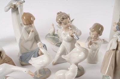 Lot 254 - A collection Lladro and Nao figures