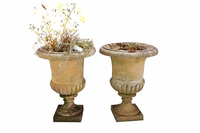 Lot 400 - A pair of stone composite garden urns