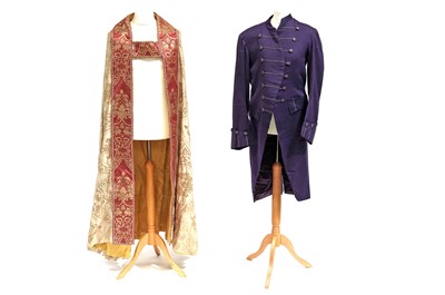 Lot 797 - A Wippell & Co purple tailcoat and ecclesiastical robe