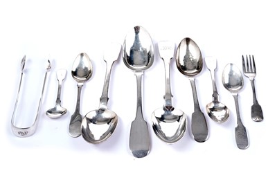 Lot 1602 - A small collection of silver Fiddle pattern flatware