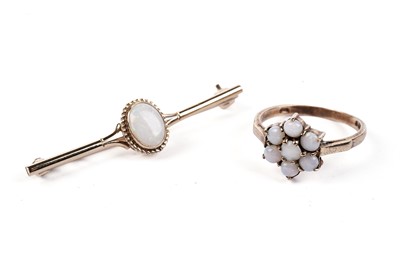 Lot 679 - An opal cluster ring; and bar brooch