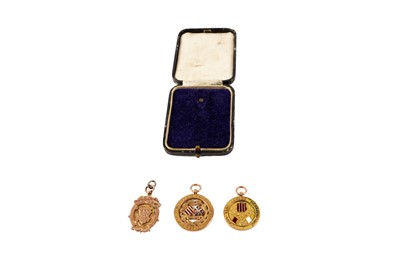 Lot 910 - Two East Tyne League Champion 1st Division winners medals and a fob