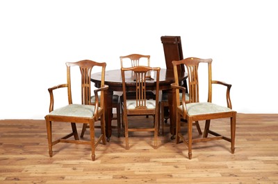 Lot 22 - An Edwardian mahogany extending dining table; a set of six dining chairs