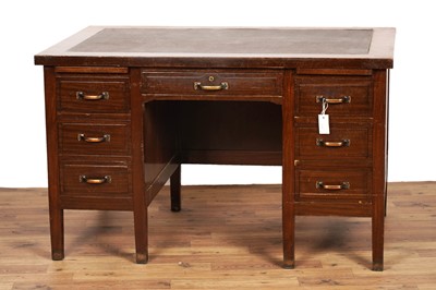 Lot 23 - A mahogany kneehole writing desk