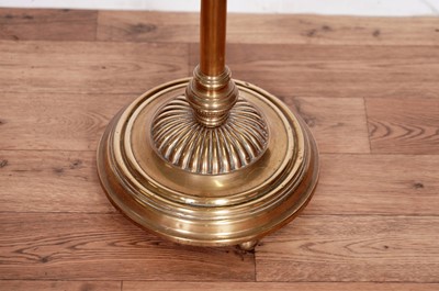 Lot 29 - An early 20th Century floor standing brass oil lamp
