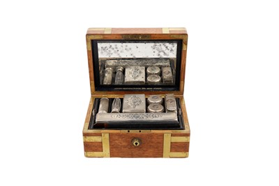 Lot 1742 - A small Victorian brass bound oak toilet box with two lift-out trays containing various items