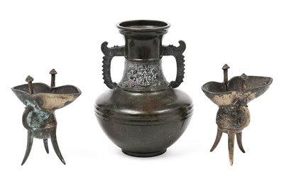 Lot 407 - A Chinese archaic style bronze vase; and a smaller pair of vessels