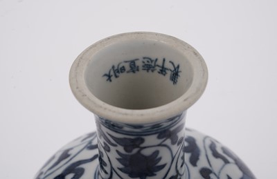 Lot 285 - A Chinese 'Blanc de Chine' figure; and a blue and white stem cup