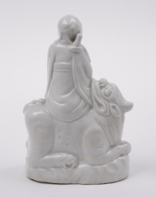 Lot 285 - A Chinese 'Blanc de Chine' figure; and a blue and white stem cup