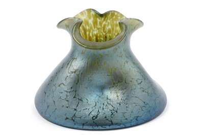 Lot 660 - A Loetz style iridescent glass vase