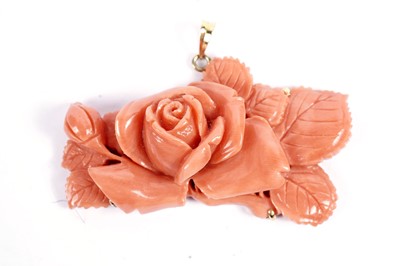 Lot 85 - A carved coral pendant in the form of a rose bloom