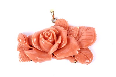 Lot 85 - A carved coral pendant in the form of a rose bloom