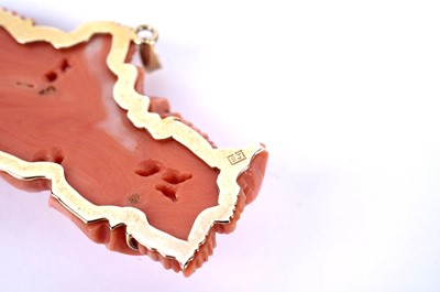 Lot 85 - A carved coral pendant in the form of a rose bloom