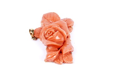 Lot 85 - A carved coral pendant in the form of a rose bloom