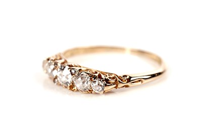 Lot 1081 - A late Victorian five stone diamond ring