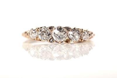 Lot 1081 - A late Victorian five stone diamond ring