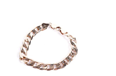 Lot 675 - A 9ct gold faceted curb-link bracelet