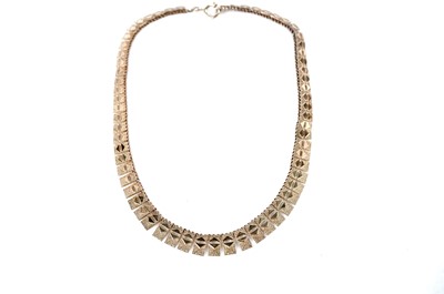 Lot 1078 - Andreas Daub, Germany: a 14ct yellow gold fringe necklace