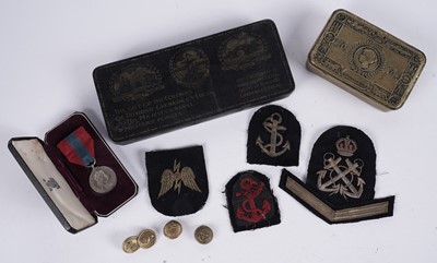 Lot 1070 - Two First World War Christmas tins; and other military items