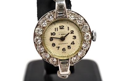 Lot 1003 - A diamond set platinum cased lady's cocktail watch