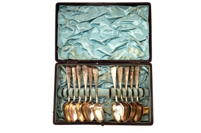 Lot 795 - Eleven silver teaspoons in fitted case