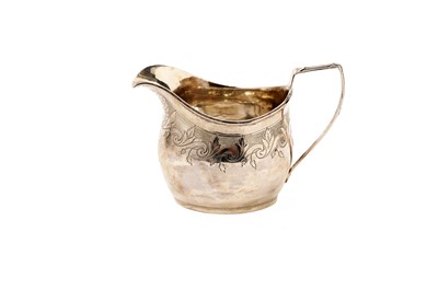 Lot 805 - A George III silver cream jug