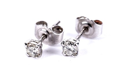 Lot 274 - A pair of diamond stud earrings