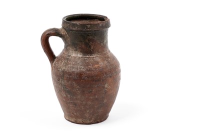 Lot 471 - A Medieval earthenware jug