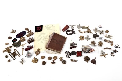 Lot 1067 - A selection of cap badges