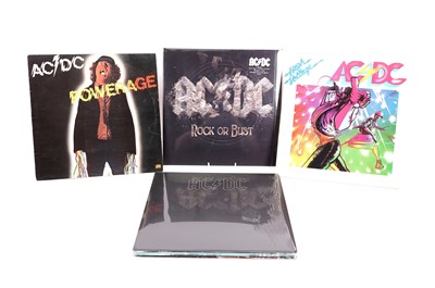 Lot 556 - AC/DC LPs and 12" Singles