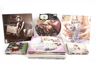 Lot 557 - A large collectors' bundle of Madonna LPs, 12" singles and 7" singles